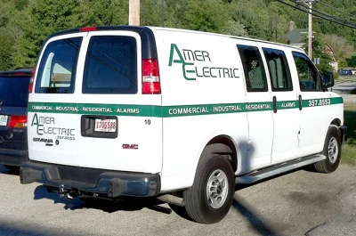 amber-electric-van-with-custom-vinyl-lettering.webp